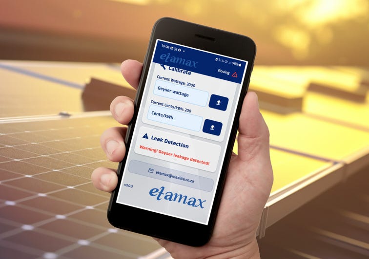 People show peace signs at a demonstration with green ribbons and backdrop cranes.